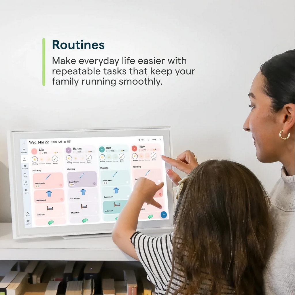 Woman and child interacting with a digital display showing daily routines.